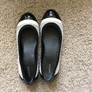 Black and white Alfani flats.